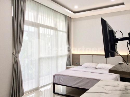 terra guesthouse jec mitra reddoorz