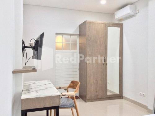 terra guesthouse jec mitra reddoorz