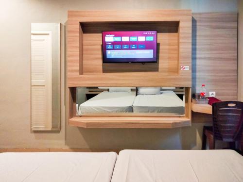 wikost premiere inn mitra reddoorz