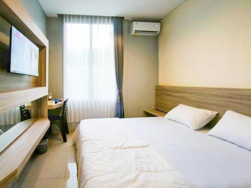 wikost premiere inn mitra reddoorz