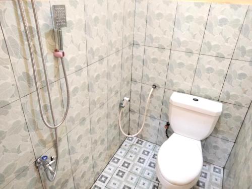 wisma mutiara near alun alun demak mitra reddoorz