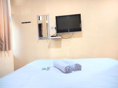 wisma mutiara near alun alun demak mitra reddoorz