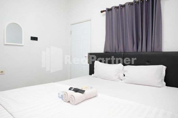 aster triplets guest house jcm mitra reddoorz