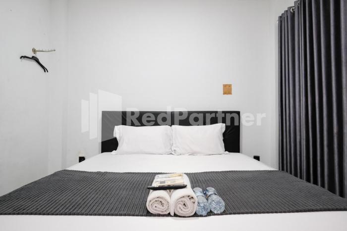 aster triplets guest house jcm mitra reddoorz
