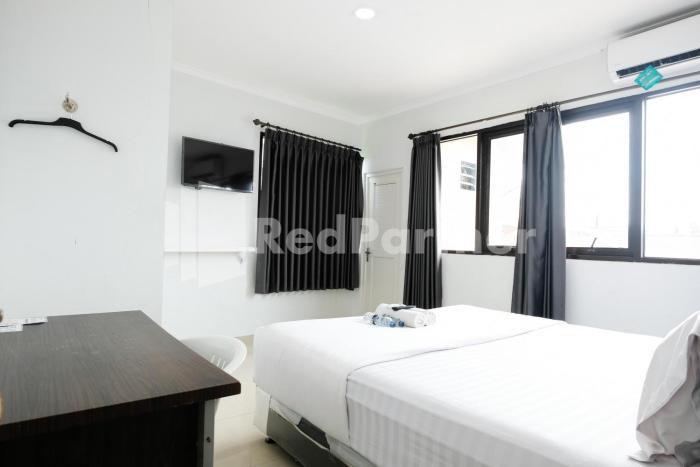 aster triplets guest house jcm mitra reddoorz