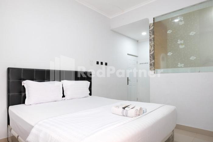 aster triplets guest house jcm mitra reddoorz