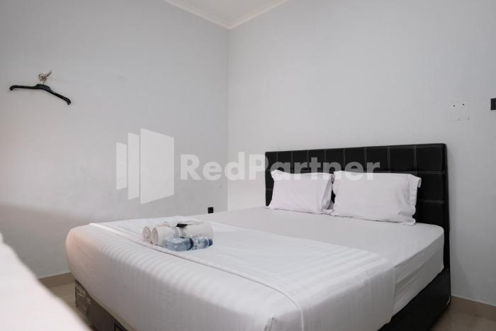 aster triplets guest house jcm mitra reddoorz