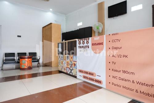 aster triplets guest house jcm mitra reddoorz
