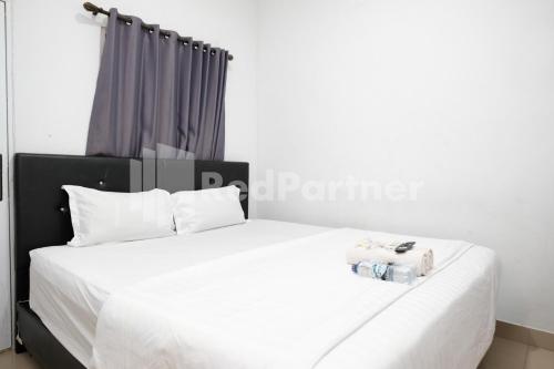 aster triplets guest house jcm mitra reddoorz