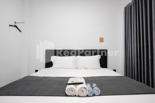 aster triplets guest house jcm mitra reddoorz