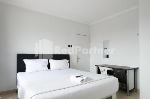 aster triplets guest house jcm mitra reddoorz