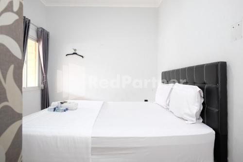 aster triplets guest house jcm mitra reddoorz