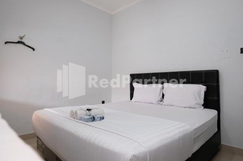 aster triplets guest house jcm mitra reddoorz
