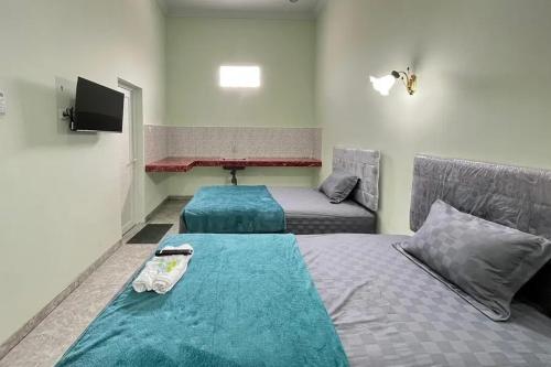 trubus guesthouse syariah magelang mitra reddoorz