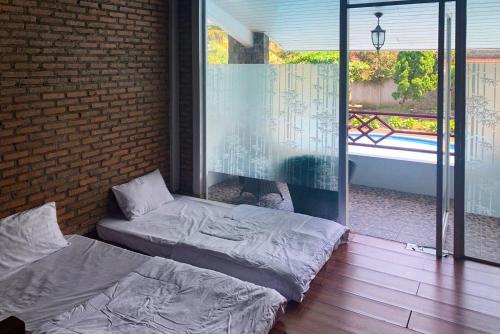 urbanview hotel villa q gisting by reddoorz
