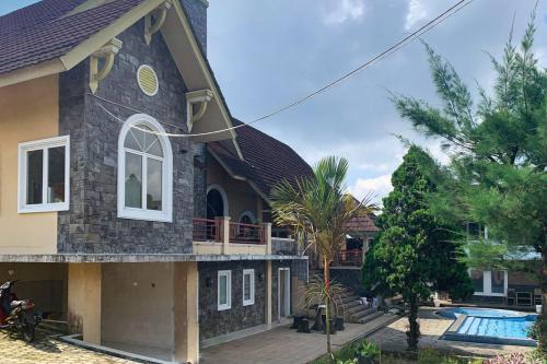 urbanview hotel villa q gisting by reddoorz