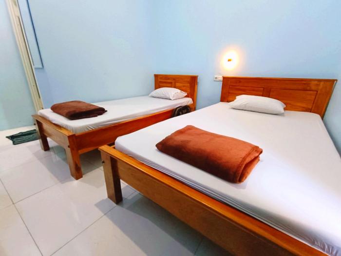 wisma kencana syariah near uns mitra reddoorz