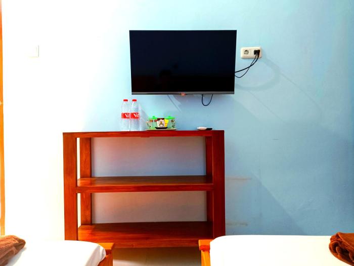 wisma kencana syariah near uns mitra reddoorz