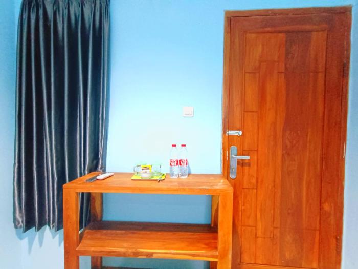 wisma kencana syariah near uns mitra reddoorz