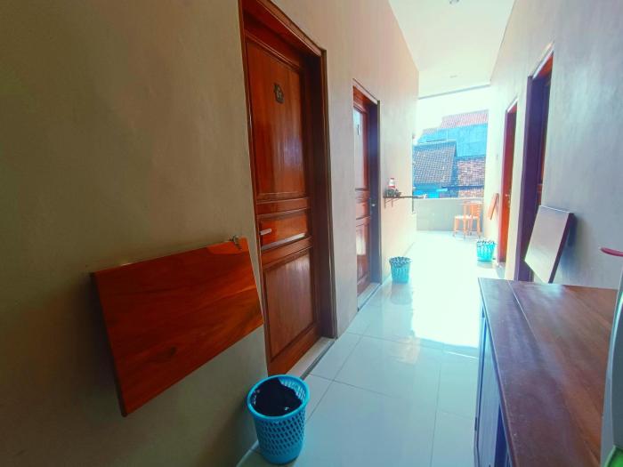 wisma kencana syariah near uns mitra reddoorz