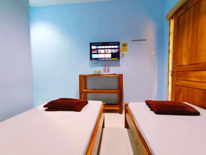 wisma kencana syariah near uns mitra reddoorz