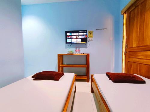 wisma kencana syariah near uns mitra reddoorz