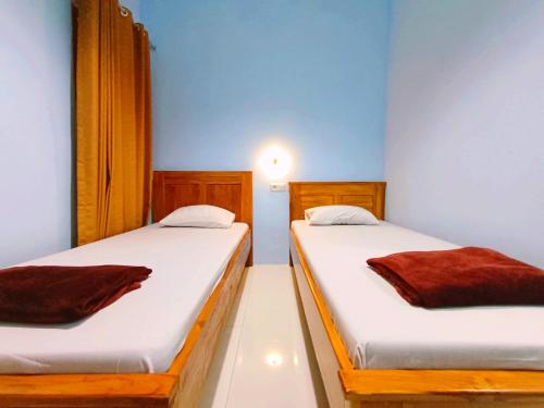 wisma kencana syariah near uns mitra reddoorz