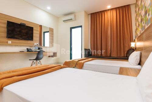 deluma hotel syariah redpartner