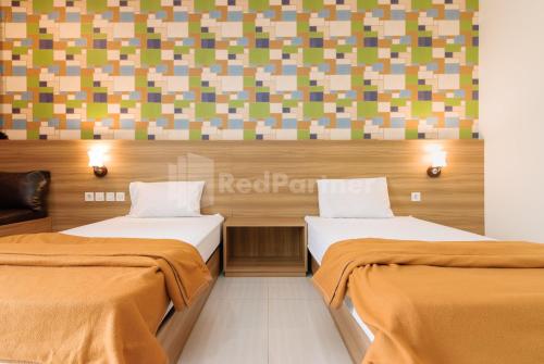 deluma hotel syariah redpartner