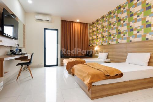 deluma hotel syariah redpartner