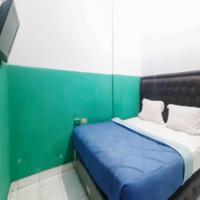 hotel niaga mitra reddoorz