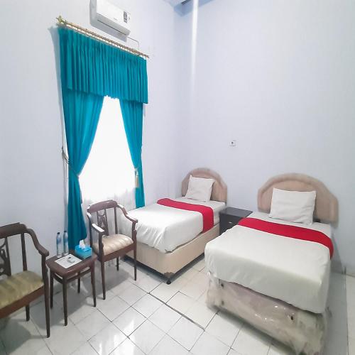 hotel niaga mitra reddoorz