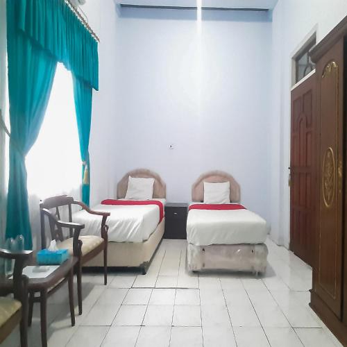 hotel niaga mitra reddoorz