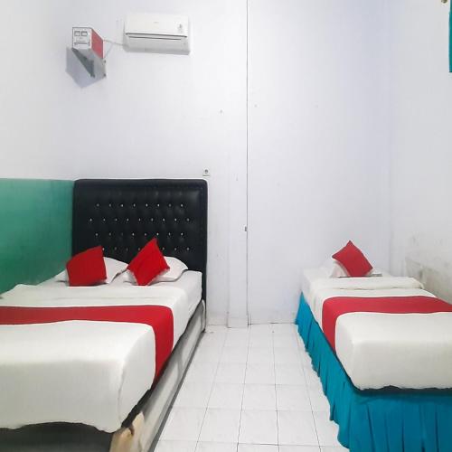 hotel niaga mitra reddoorz