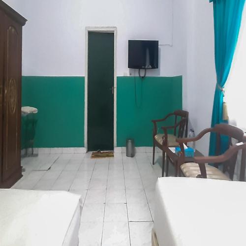 hotel niaga mitra reddoorz
