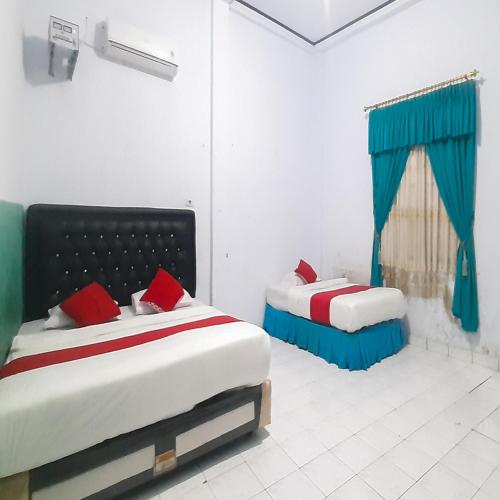 hotel niaga mitra reddoorz