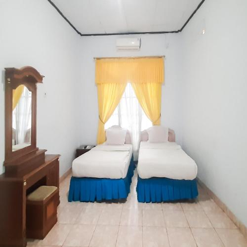 hotel niaga mitra reddoorz