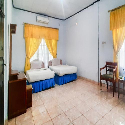 hotel niaga mitra reddoorz