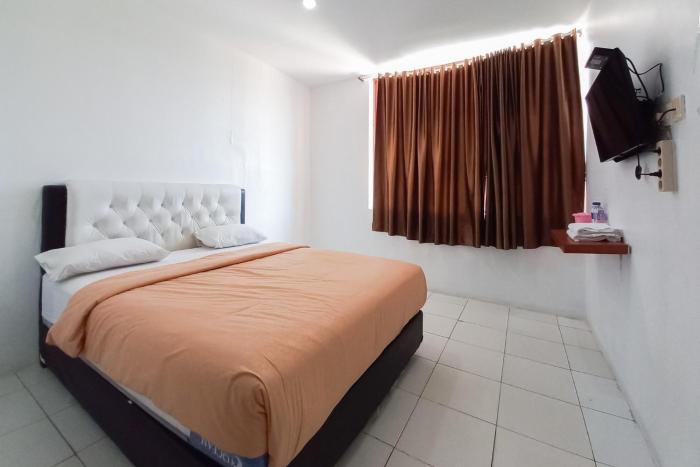 joy guesthouse pekanbaru mitra reddoorz