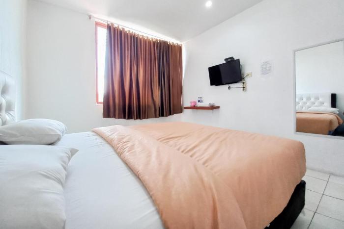 joy guesthouse pekanbaru mitra reddoorz