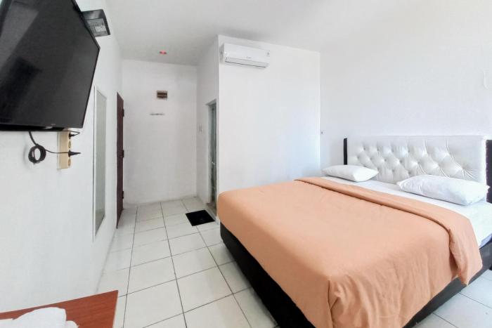 joy guesthouse pekanbaru mitra reddoorz