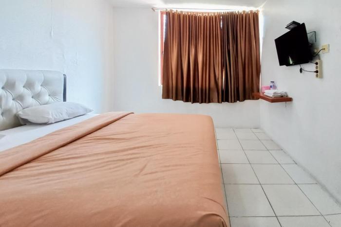 joy guesthouse pekanbaru mitra reddoorz