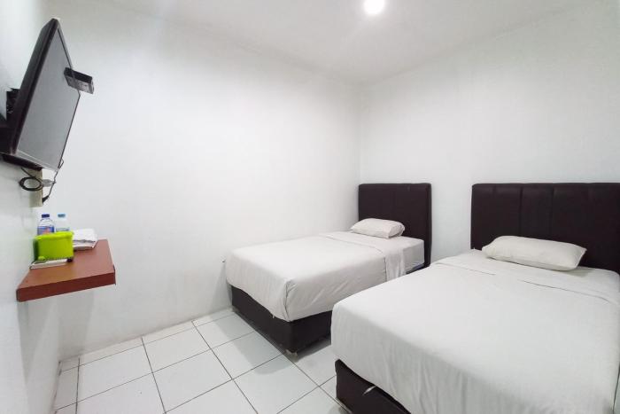 joy guesthouse pekanbaru mitra reddoorz