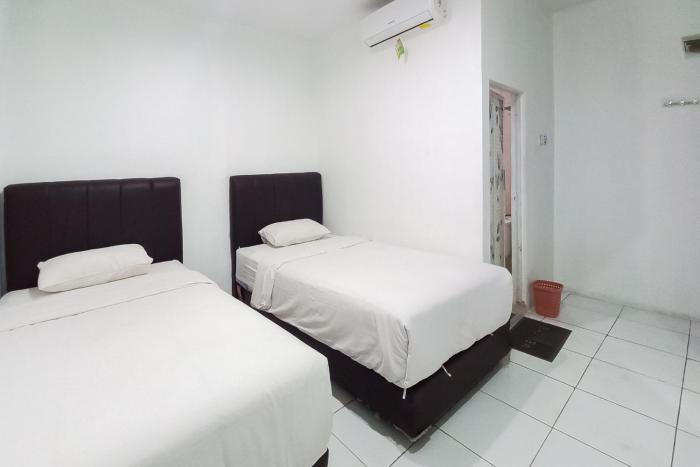 joy guesthouse pekanbaru mitra reddoorz