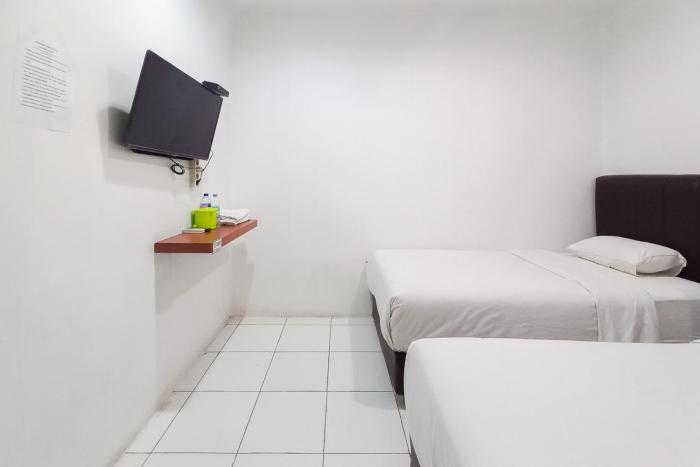 joy guesthouse pekanbaru mitra reddoorz