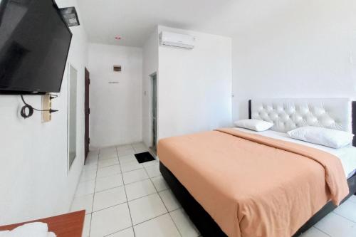 joy guesthouse pekanbaru mitra reddoorz