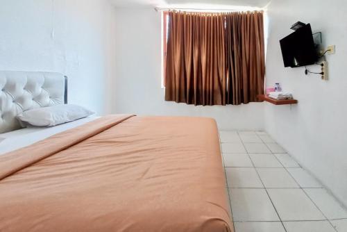 joy guesthouse pekanbaru mitra reddoorz