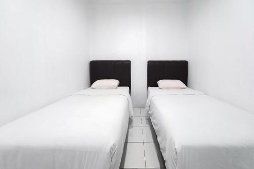 joy guesthouse pekanbaru mitra reddoorz