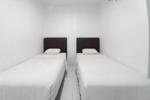 joy guesthouse pekanbaru mitra reddoorz