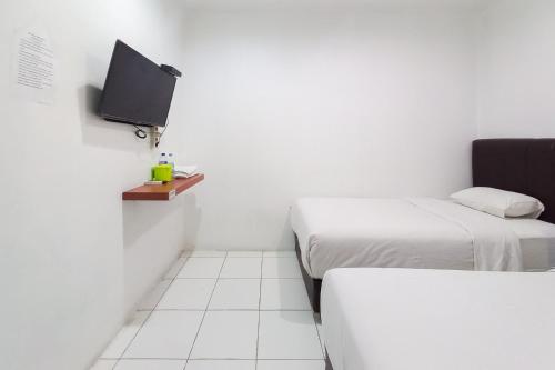 joy guesthouse pekanbaru mitra reddoorz